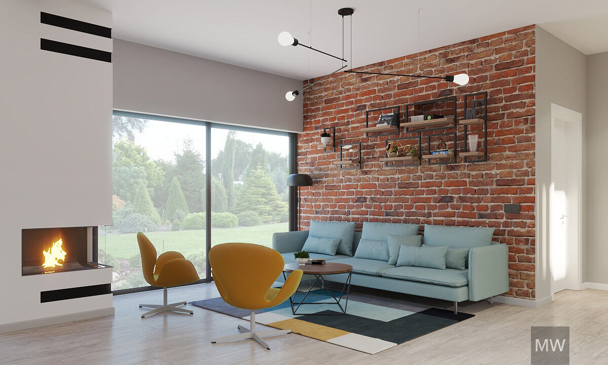 Living modern cu perete de cărămidă, șemineu și accente colorate Living modern cu perete de cărămidă, șemineu, canapea albastră, fotolii galbene și candelabru contemporan.